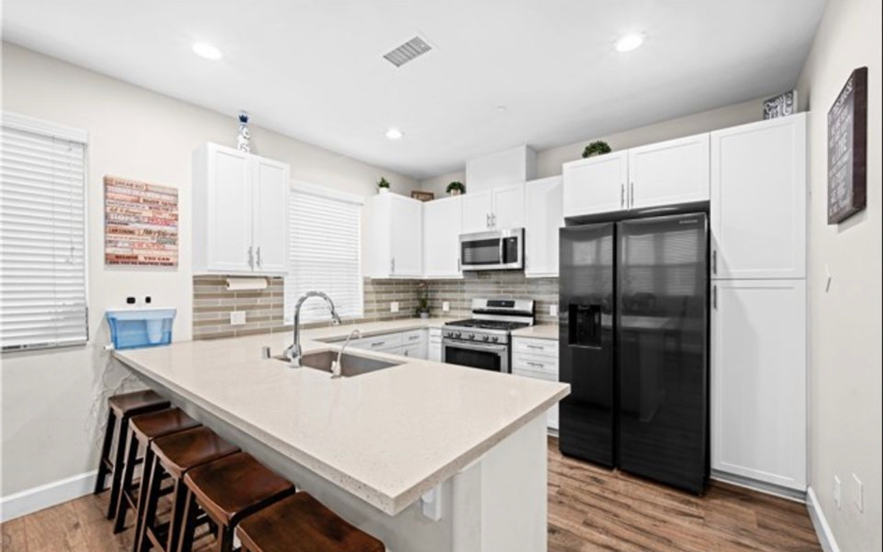 Modern kitchen with stainless steel appliances